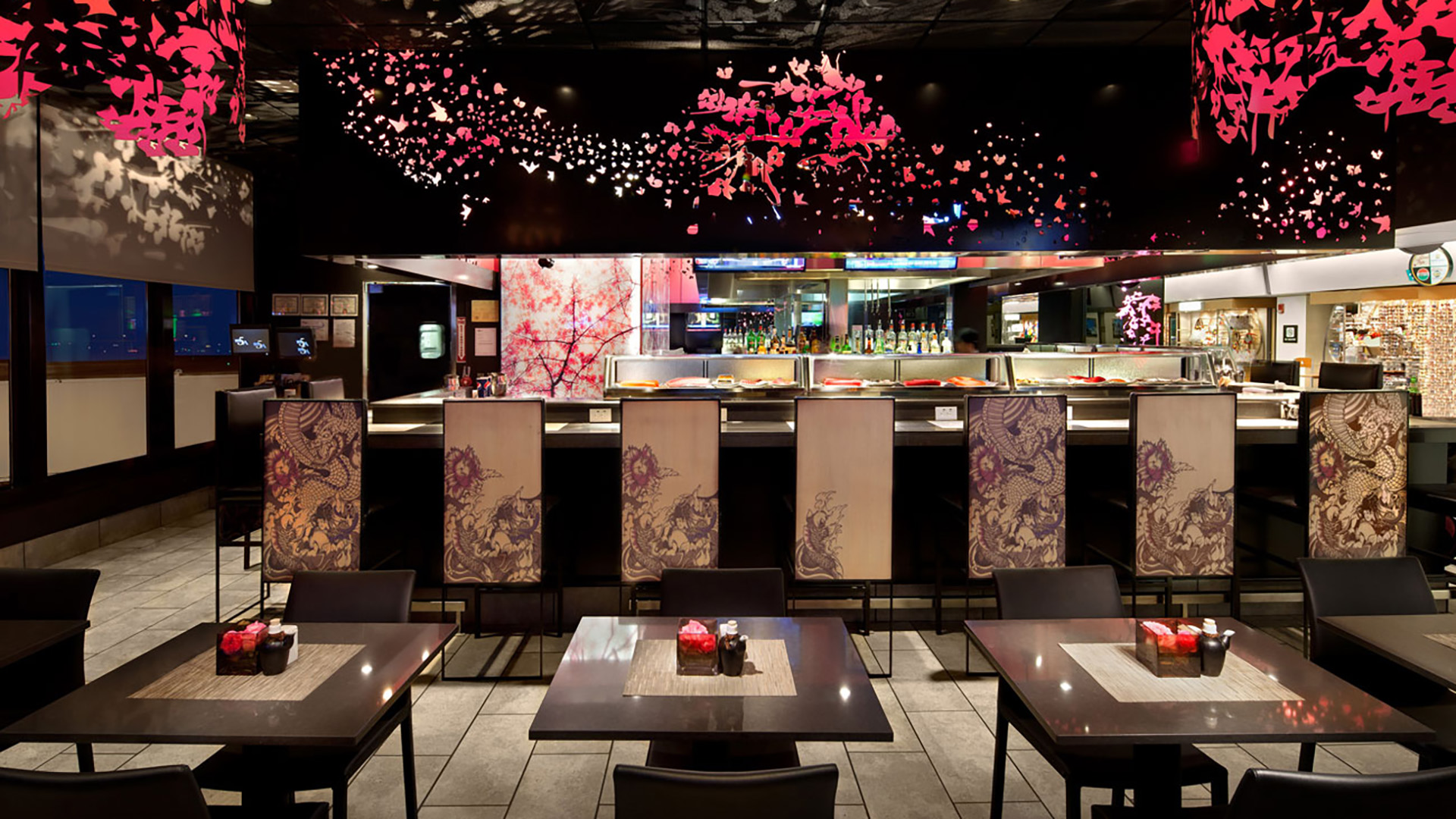 Asian restaurant, black metal panels with pink cherry blossom motif